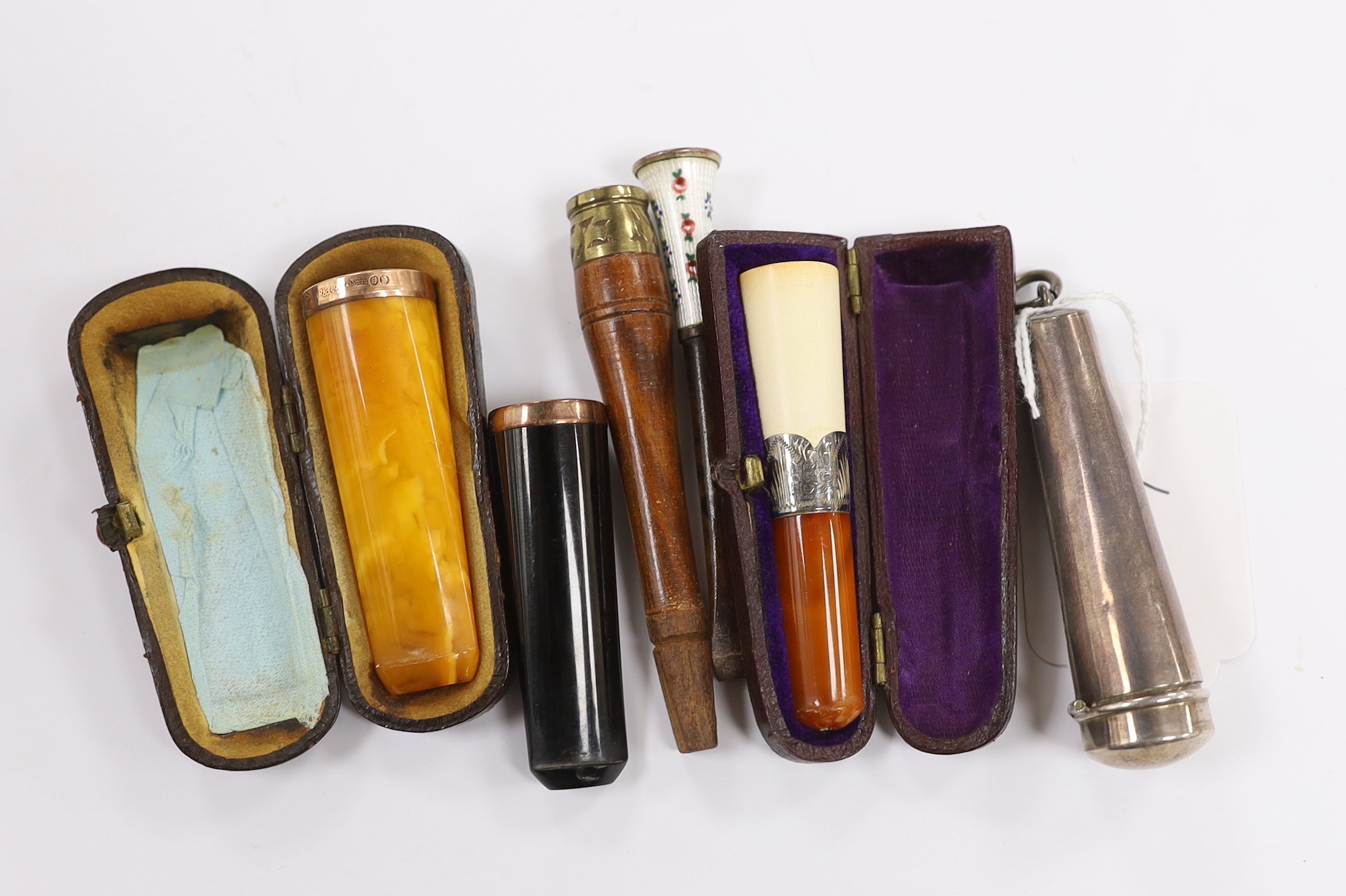 A silver cheroot holder case and others